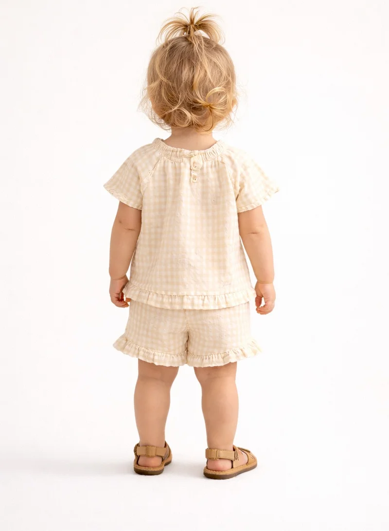 ديركجي طقم بناتي قطعتين بلوزة بأكمام مكشكشة وشورت من نسيج الوافل